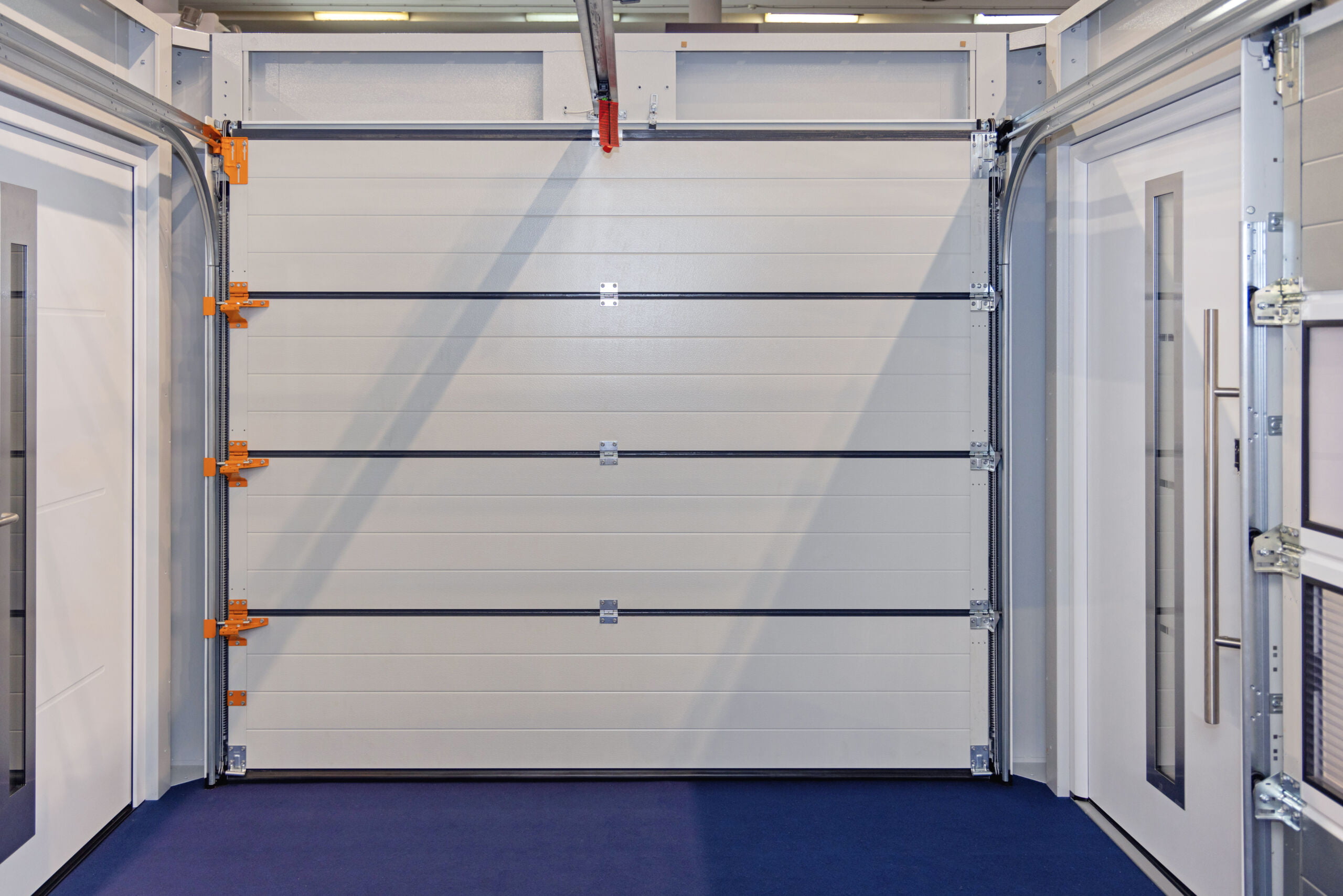 image of closed garage doors white in colour Interior View